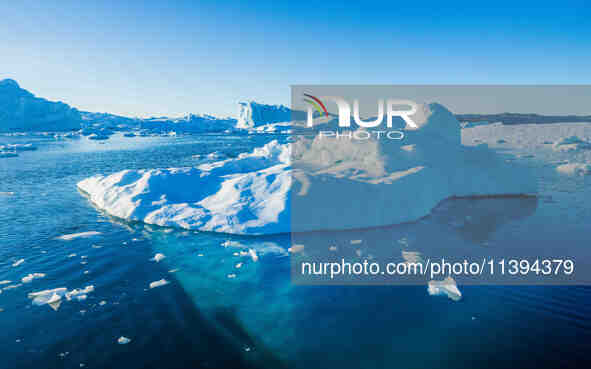 The Ilulissat Icefjord, also known as Sermeq Kujalleq, is draining approximately 7% of Greenland's ice sheet in Ilulissat, Greenland, on Jun...