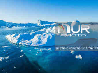 The Ilulissat Icefjord, also known as Sermeq Kujalleq, is draining approximately 7% of Greenland's ice sheet in Ilulissat, Greenland, on Jun...