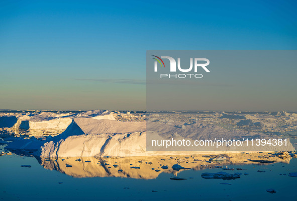 The Ilulissat Icefjord, also known as Sermeq Kujalleq, is draining approximately 7% of Greenland's ice sheet in Ilulissat, Greenland, on Jun...