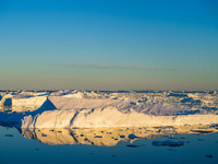 The Ilulissat Icefjord, also known as Sermeq Kujalleq, is draining approximately 7% of Greenland's ice sheet in Ilulissat, Greenland, on Jun...