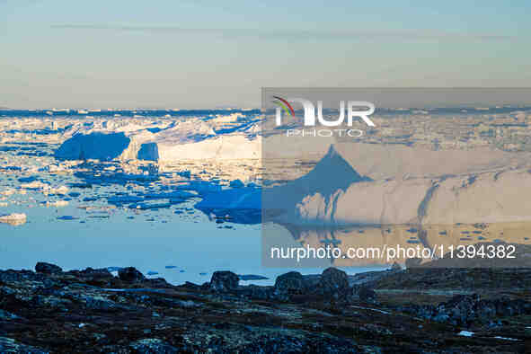 The Ilulissat Icefjord, also known as Sermeq Kujalleq, is draining approximately 7% of Greenland's ice sheet in Ilulissat, Greenland, on Jun...