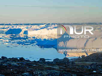 The Ilulissat Icefjord, also known as Sermeq Kujalleq, is draining approximately 7% of Greenland's ice sheet in Ilulissat, Greenland, on Jun...