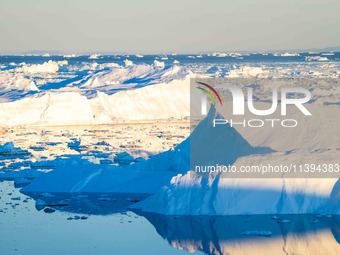 The Ilulissat Icefjord, also known as Sermeq Kujalleq, is draining approximately 7% of Greenland's ice sheet in Ilulissat, Greenland, on Jun...