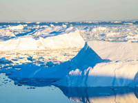 The Ilulissat Icefjord, also known as Sermeq Kujalleq, is draining approximately 7% of Greenland's ice sheet in Ilulissat, Greenland, on Jun...