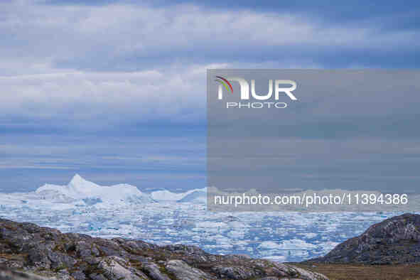 The Ilulissat Icefjord, also known as Sermeq Kujalleq, is draining approximately 7% of Greenland's ice sheet in Ilulissat, Greenland, on Jun...