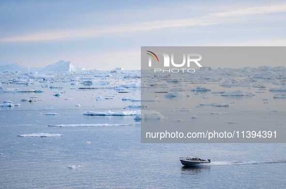 The Ilulissat Icefjord, also known as Sermeq Kujalleq, is draining approximately 7% of Greenland's ice sheet in Ilulissat, Greenland, on Jun...