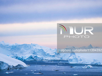 The Ilulissat Icefjord, also known as Sermeq Kujalleq, is draining approximately 7% of Greenland's ice sheet in Ilulissat, Greenland, on Jun...