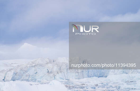 The Ilulissat Icefjord, also known as Sermeq Kujalleq, is draining approximately 7% of Greenland's ice sheet. This glacier, the largest outs...