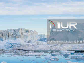 The Ilulissat Icefjord, also known as Sermeq Kujalleq, is draining approximately 7% of Greenland's ice sheet in Ilulissat, Greenland, on Jul...