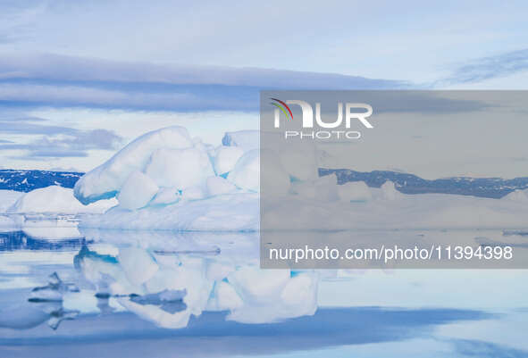 The Ilulissat Icefjord, also known as Sermeq Kujalleq, is draining approximately 7% of Greenland's ice sheet in Ilulissat, Greenland, on Jul...