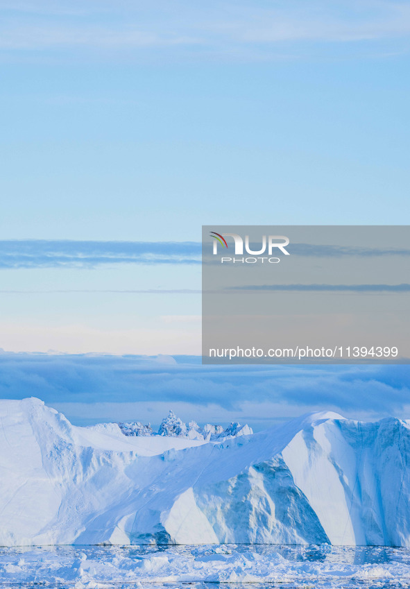 The Ilulissat Icefjord, also known as Sermeq Kujalleq, is draining approximately 7% of Greenland's ice sheet in Ilulissat, Greenland, on Jul...