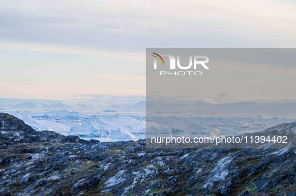 The Ilulissat Icefjord, also known as Sermeq Kujalleq, is draining approximately 7% of Greenland's ice sheet in Ilulissat, Greenland, on Jul...