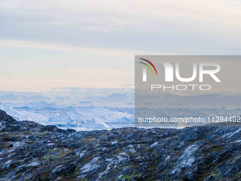 The Ilulissat Icefjord, also known as Sermeq Kujalleq, is draining approximately 7% of Greenland's ice sheet in Ilulissat, Greenland, on Jul...