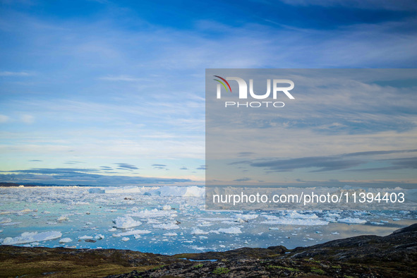 The Ilulissat Icefjord, also known as Sermeq Kujalleq, is draining approximately 7% of Greenland's ice sheet in Ilulissat, Greenland, on Jul...