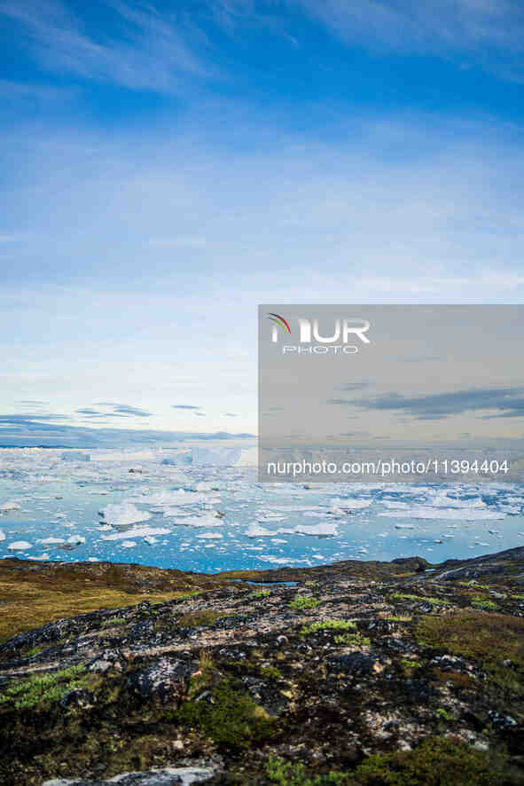 The Ilulissat Icefjord, also known as Sermeq Kujalleq, is draining approximately 7% of Greenland's ice sheet in Ilulissat, Greenland, on Jul...