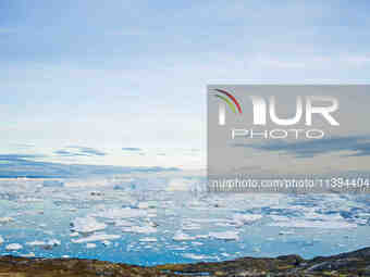 The Ilulissat Icefjord, also known as Sermeq Kujalleq, is draining approximately 7% of Greenland's ice sheet in Ilulissat, Greenland, on Jul...