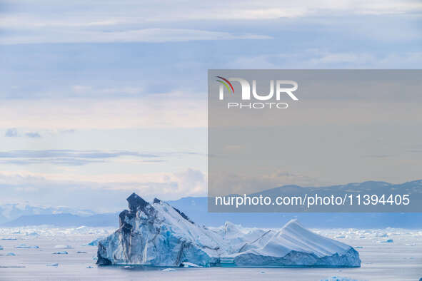 The Ilulissat Icefjord, also known as Sermeq Kujalleq, is draining approximately 7% of Greenland's ice sheet. This glacier, the largest outs...