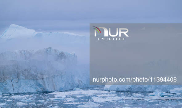 The Ilulissat Icefjord, also known as Sermeq Kujalleq, is draining approximately 7% of Greenland's ice sheet. This glacier, the largest outs...