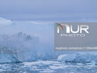 The Ilulissat Icefjord, also known as Sermeq Kujalleq, is draining approximately 7% of Greenland's ice sheet. This glacier, the largest outs...