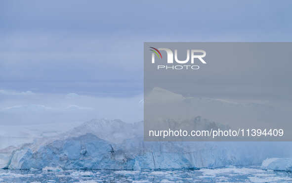 The Ilulissat Icefjord, also known as Sermeq Kujalleq, is draining approximately 7% of Greenland's ice sheet. This glacier, the largest outs...