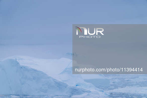 The Ilulissat Icefjord, also known as Sermeq Kujalleq, is draining approximately 7% of Greenland's ice sheet. This glacier, the largest outs...