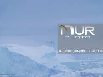 The Ilulissat Icefjord, also known as Sermeq Kujalleq, is draining approximately 7% of Greenland's ice sheet. This glacier, the largest outs...