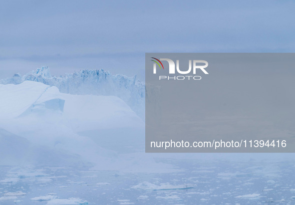 The Ilulissat Icefjord, also known as Sermeq Kujalleq, is draining approximately 7% of Greenland's ice sheet. This glacier, the largest outs...