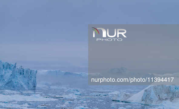 The Ilulissat Icefjord, also known as Sermeq Kujalleq, is draining approximately 7% of Greenland's ice sheet. This glacier, the largest outs...