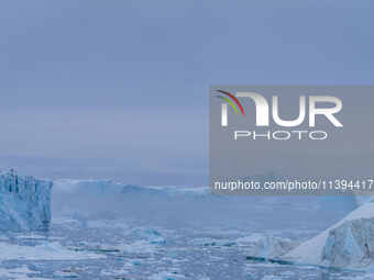 The Ilulissat Icefjord, also known as Sermeq Kujalleq, is draining approximately 7% of Greenland's ice sheet. This glacier, the largest outs...