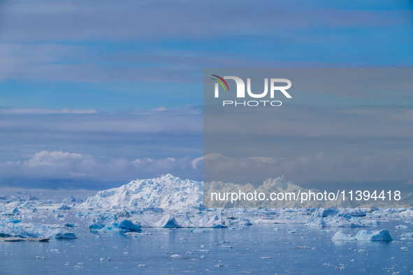 The Ilulissat Icefjord, also known as Sermeq Kujalleq, is draining approximately 7% of Greenland's ice sheet. This glacier, the largest outs...