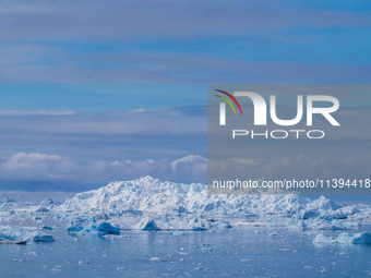 The Ilulissat Icefjord, also known as Sermeq Kujalleq, is draining approximately 7% of Greenland's ice sheet. This glacier, the largest outs...