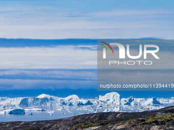 The Ilulissat Icefjord, also known as Sermeq Kujalleq, is draining approximately 7% of Greenland's ice sheet. This glacier, the largest outs...