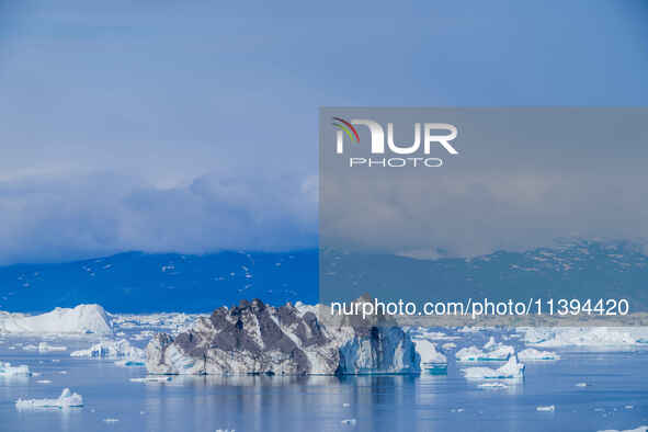 The Ilulissat Icefjord, also known as Sermeq Kujalleq, is draining approximately 7% of Greenland's ice sheet. This glacier, the largest outs...