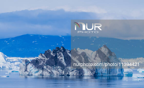 The Ilulissat Icefjord, also known as Sermeq Kujalleq, is draining approximately 7% of Greenland's ice sheet. This glacier, the largest outs...