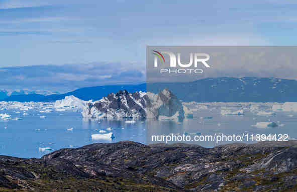 The Ilulissat Icefjord, also known as Sermeq Kujalleq, is draining approximately 7% of Greenland's ice sheet. This glacier, the largest outs...