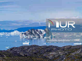 The Ilulissat Icefjord, also known as Sermeq Kujalleq, is draining approximately 7% of Greenland's ice sheet. This glacier, the largest outs...