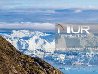 The Ilulissat Icefjord, also known as Sermeq Kujalleq, is draining approximately 7% of Greenland's ice sheet in Ilulissat, Greenland, on Jul...