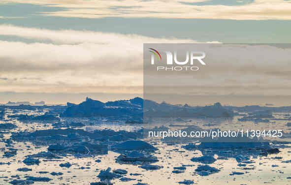 The Ilulissat Icefjord, also known as Sermeq Kujalleq, is draining approximately 7% of Greenland's ice sheet in Ilulissat, Greenland, on Jul...