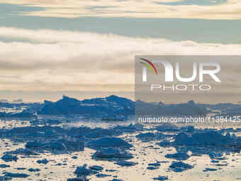 The Ilulissat Icefjord, also known as Sermeq Kujalleq, is draining approximately 7% of Greenland's ice sheet in Ilulissat, Greenland, on Jul...