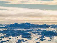 The Ilulissat Icefjord, also known as Sermeq Kujalleq, is draining approximately 7% of Greenland's ice sheet in Ilulissat, Greenland, on Jul...