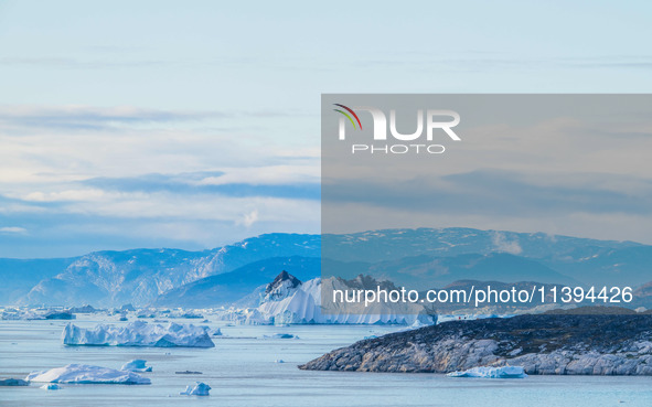 The Ilulissat Icefjord, also known as Sermeq Kujalleq, is draining approximately 7% of Greenland's ice sheet in Ilulissat, Greenland, on Jul...