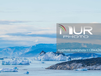 The Ilulissat Icefjord, also known as Sermeq Kujalleq, is draining approximately 7% of Greenland's ice sheet in Ilulissat, Greenland, on Jul...