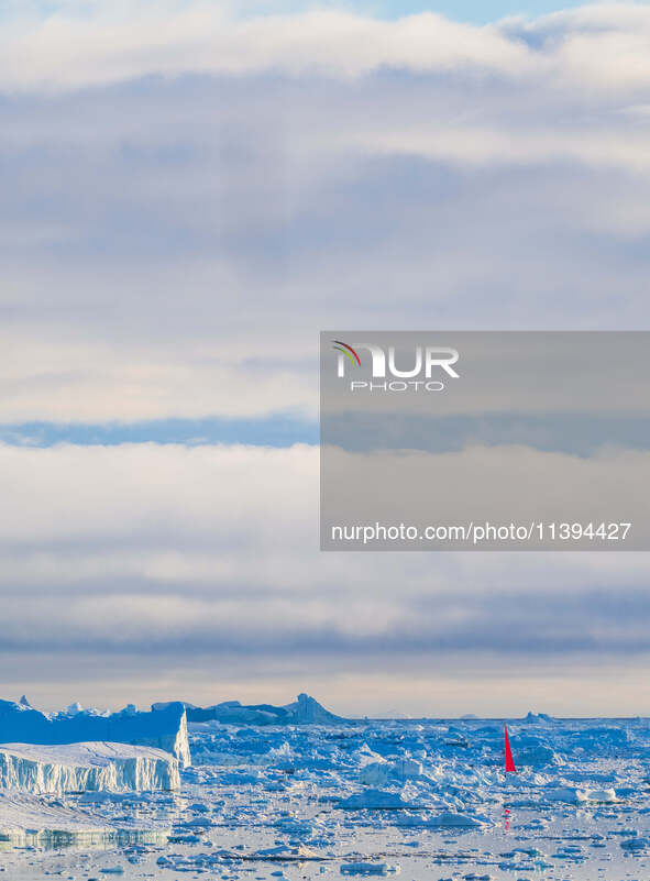 The Ilulissat Icefjord, also known as Sermeq Kujalleq, is draining approximately 7% of Greenland's ice sheet in Ilulissat, Greenland, on Jun...