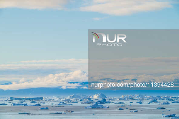 The Ilulissat Icefjord, also known as Sermeq Kujalleq, is draining approximately 7% of Greenland's ice sheet in Ilulissat, Greenland, on Jul...