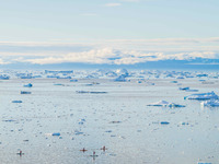 The Ilulissat Icefjord, also known as Sermeq Kujalleq, is draining approximately 7% of Greenland's ice sheet in Ilulissat, Greenland, on Jul...