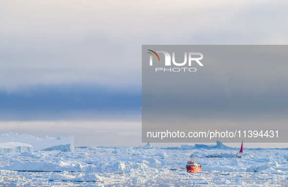 The Ilulissat Icefjord, also known as Sermeq Kujalleq, is draining approximately 7% of Greenland's ice sheet in Ilulissat, Greenland, on Jun...