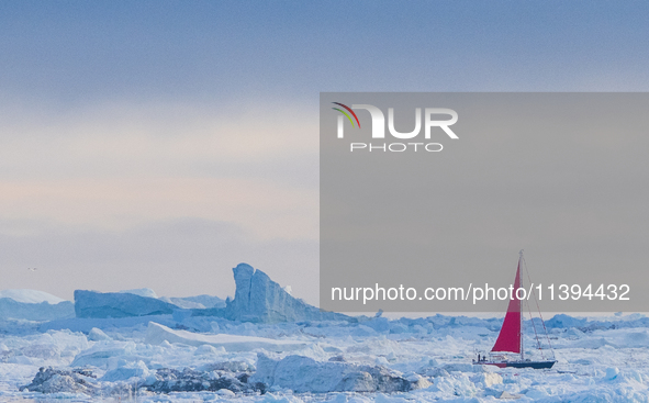 The Ilulissat Icefjord, also known as Sermeq Kujalleq, is draining approximately 7% of Greenland's ice sheet in Ilulissat, Greenland, on Jun...