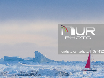 The Ilulissat Icefjord, also known as Sermeq Kujalleq, is draining approximately 7% of Greenland's ice sheet in Ilulissat, Greenland, on Jun...