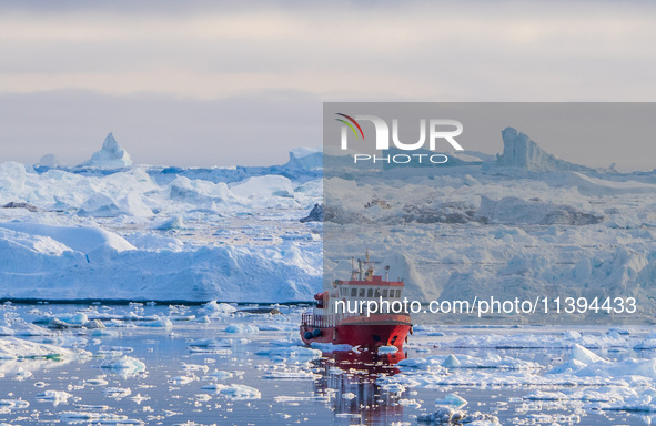 The Ilulissat Icefjord, also known as Sermeq Kujalleq, is draining approximately 7% of Greenland's ice sheet in Ilulissat, Greenland, on Jun...