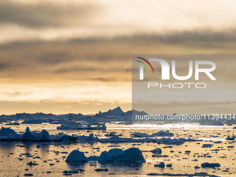 The Ilulissat Icefjord, also known as Sermeq Kujalleq, is draining approximately 7% of Greenland's ice sheet in Ilulissat, Greenland, on Jul...